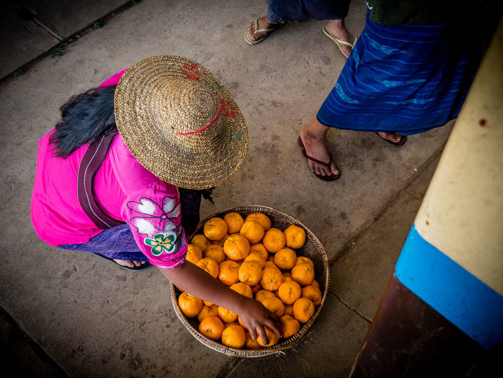 Selling oranges at the train station