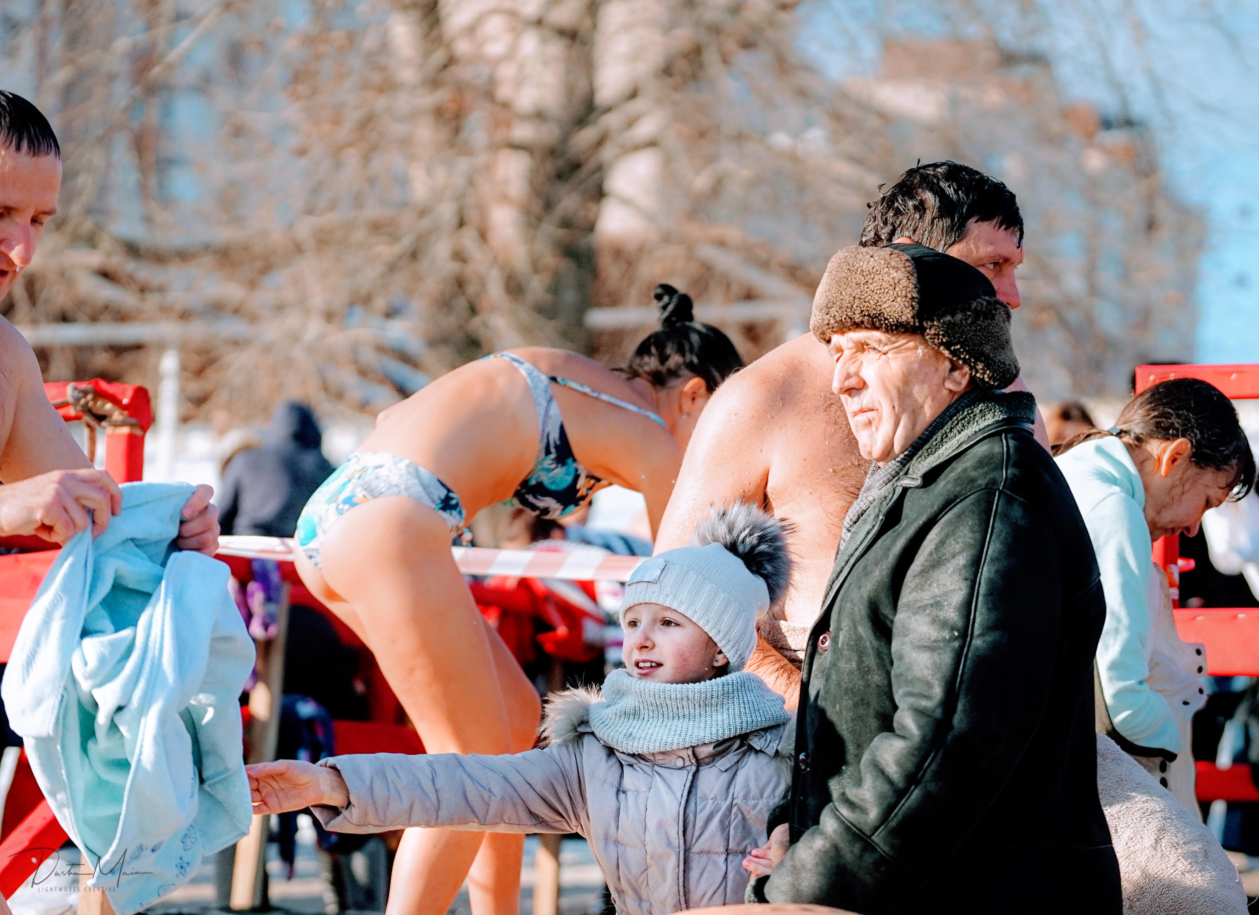  Young Ukrainian girl handing out a towel © Dustin Main 2019 