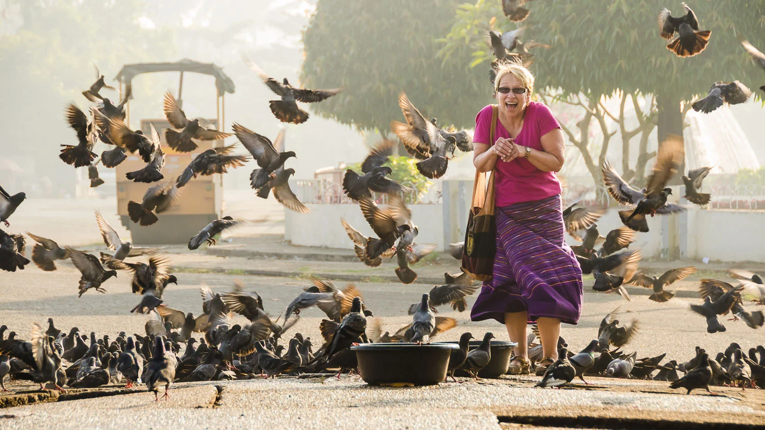 This is Shirley (wearing a traditional Myanmar longyi) on what has been dubbed "The Trip of a Lifetime" to Myanmar when I took her on the very first tour. She thinks you should go.