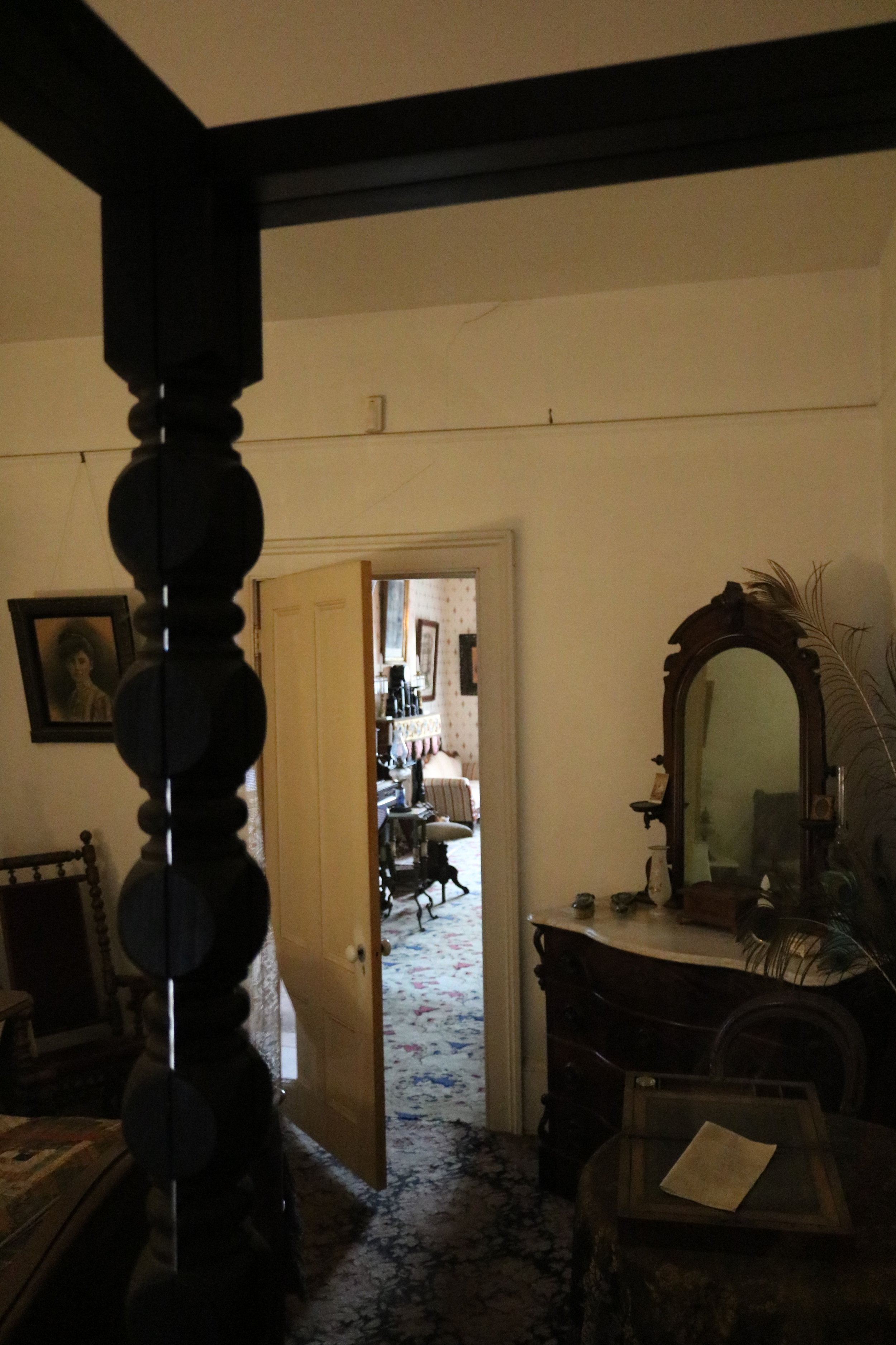 The back bedroom of the first story of the Whaley House has a number of paranormal rumors.
