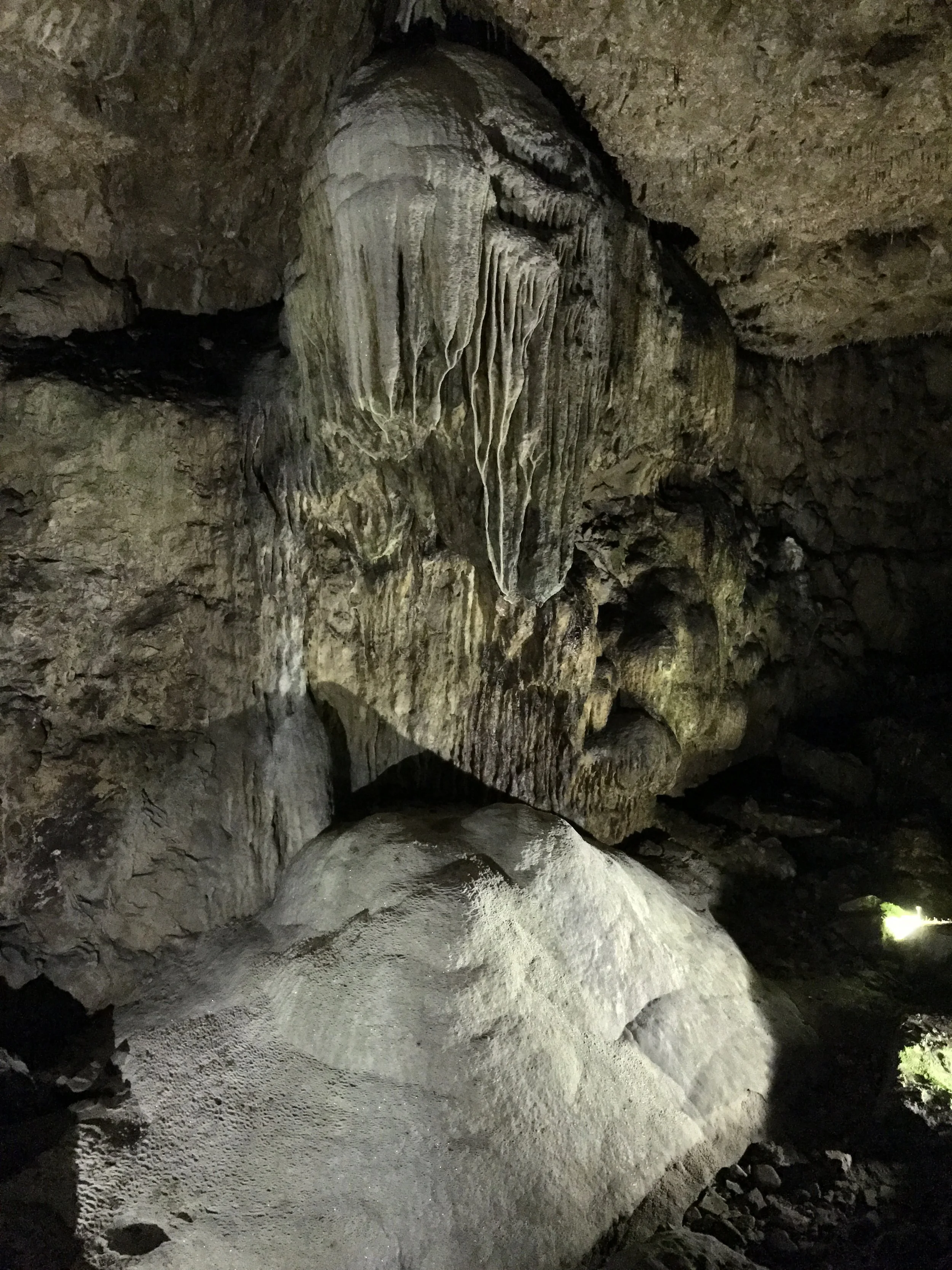 While there are a number of beautiful calcite features in the cave, the cave is also the final resting spot for a number of people.