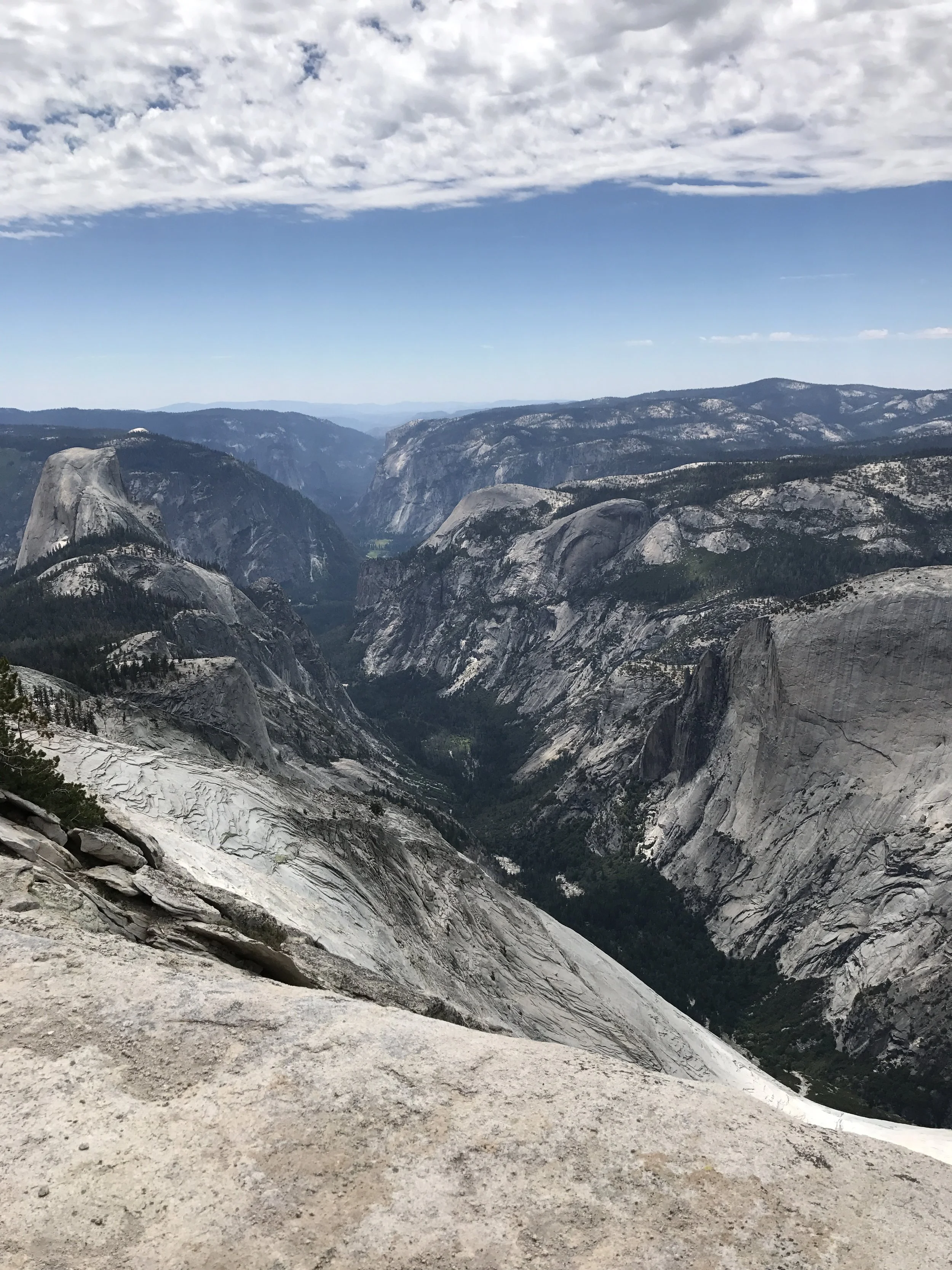 The summit has excellent views of the whole park, including Tenaya Canyon and Half Dome