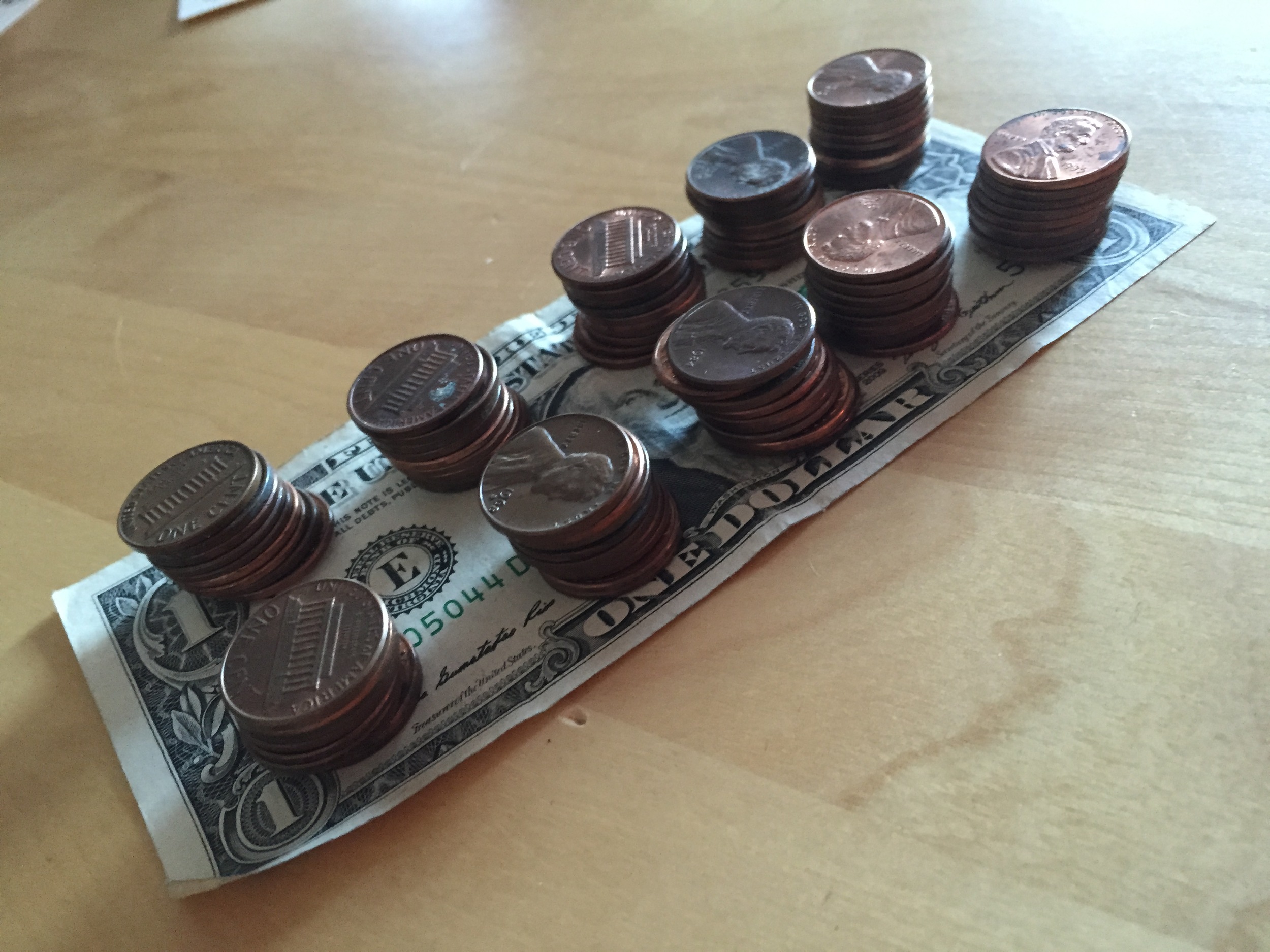 Ten Stacks of Ten Pennies = $1.00