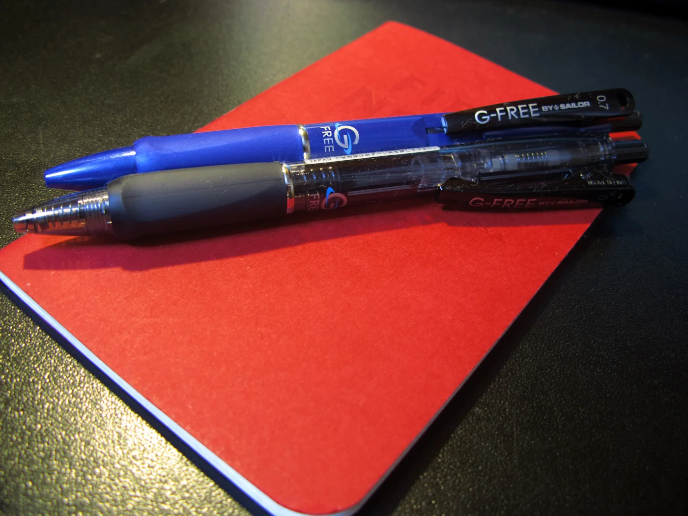 Two versions of the G-Free by Sailor on a Field Notes Red Blooded.