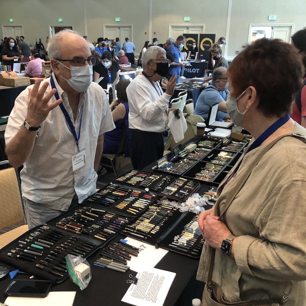 Paul Erano (with one of the show owners, Syd Saperstein to his left) talking about vintage pens and the Black Pen Society.