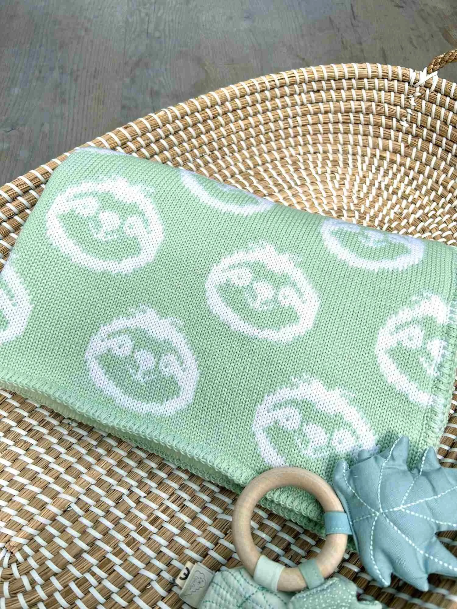 sloth blanket in green