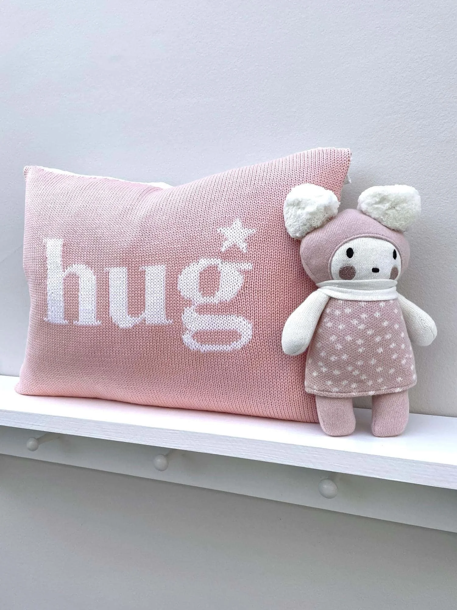 pink luxury hug merino cushion