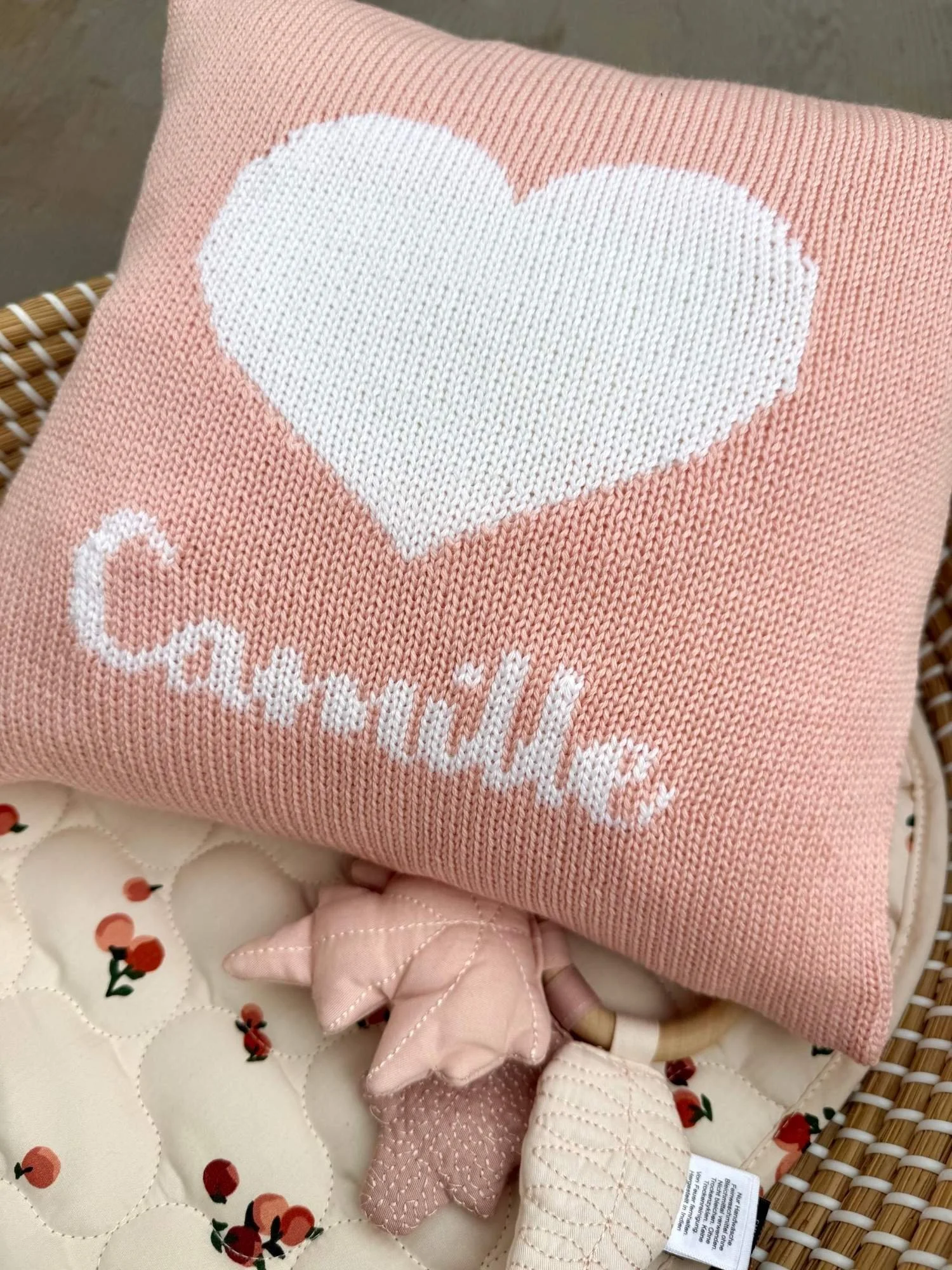 personalised pink heart knitted cushion