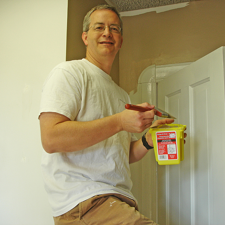  Scott Witzig helping paint the first MCF Office at 309 N Main, Suite B. 