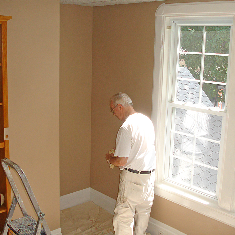  Harold Witzig helping paint the first MCF Office at 309 N Main, Suite B. 