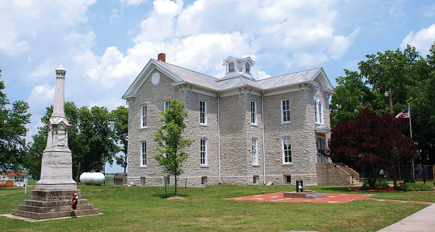 Hamilton Primary School showing monument to Dr. Silas Hamilton, by freed slave, George Washington.