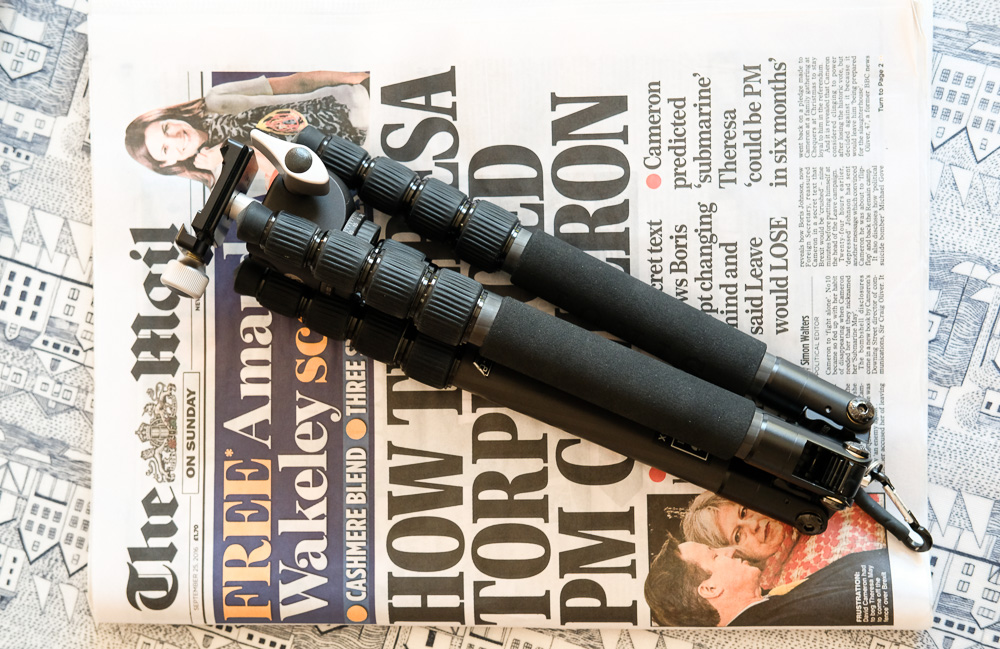 The SIRUI folds down very compact. Here it is on top of a Daily Mail Newspaper for scale.