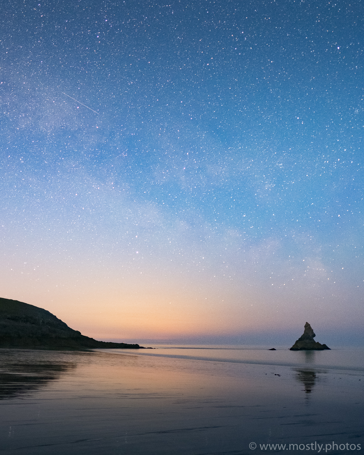 Fuji X-T2 - Fuji 16mm f1.4 - (20 second exposure, ISO 3200, f1.4) Milky Way and shooting Star over Church Rock - Broad Haven Beach, Wales