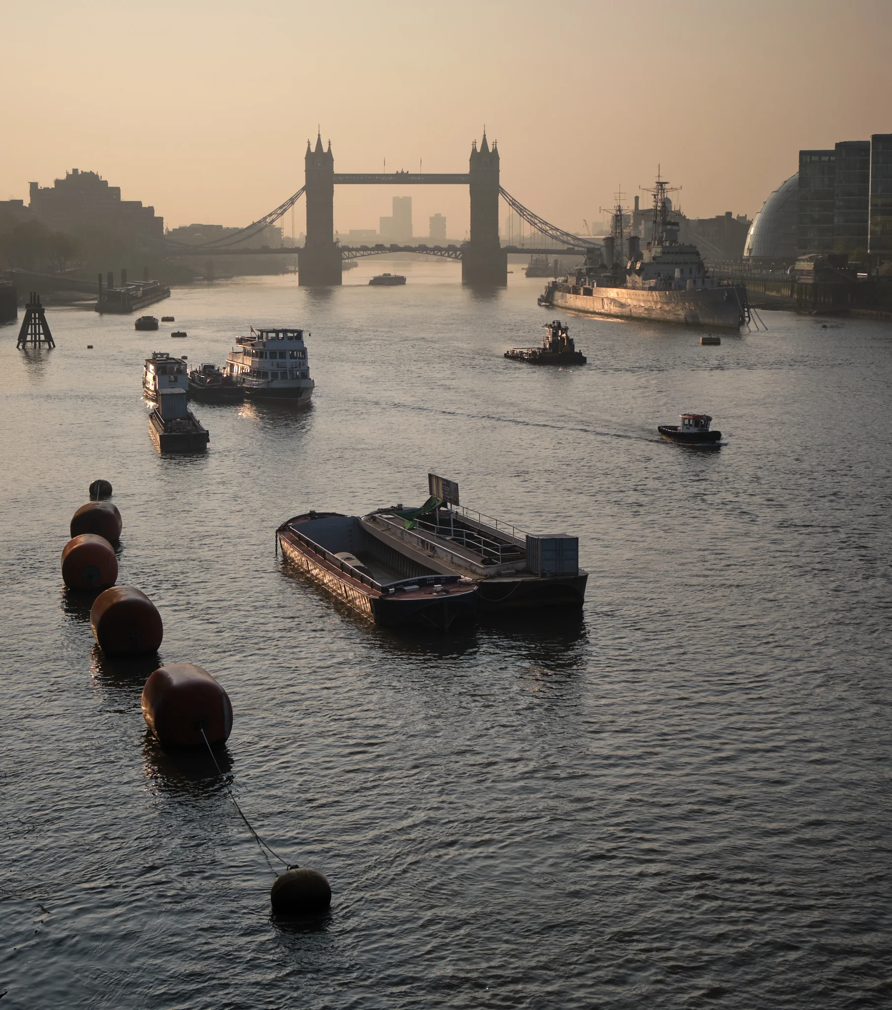 Tower Bridge and HMS Belfast reflected in the Thames Shot on Fuji X-T3 and 16-55mm f2.8