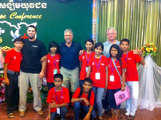  Mike Hunsader and other guests pose at church with the staff and kids of Prek Eng 5.  