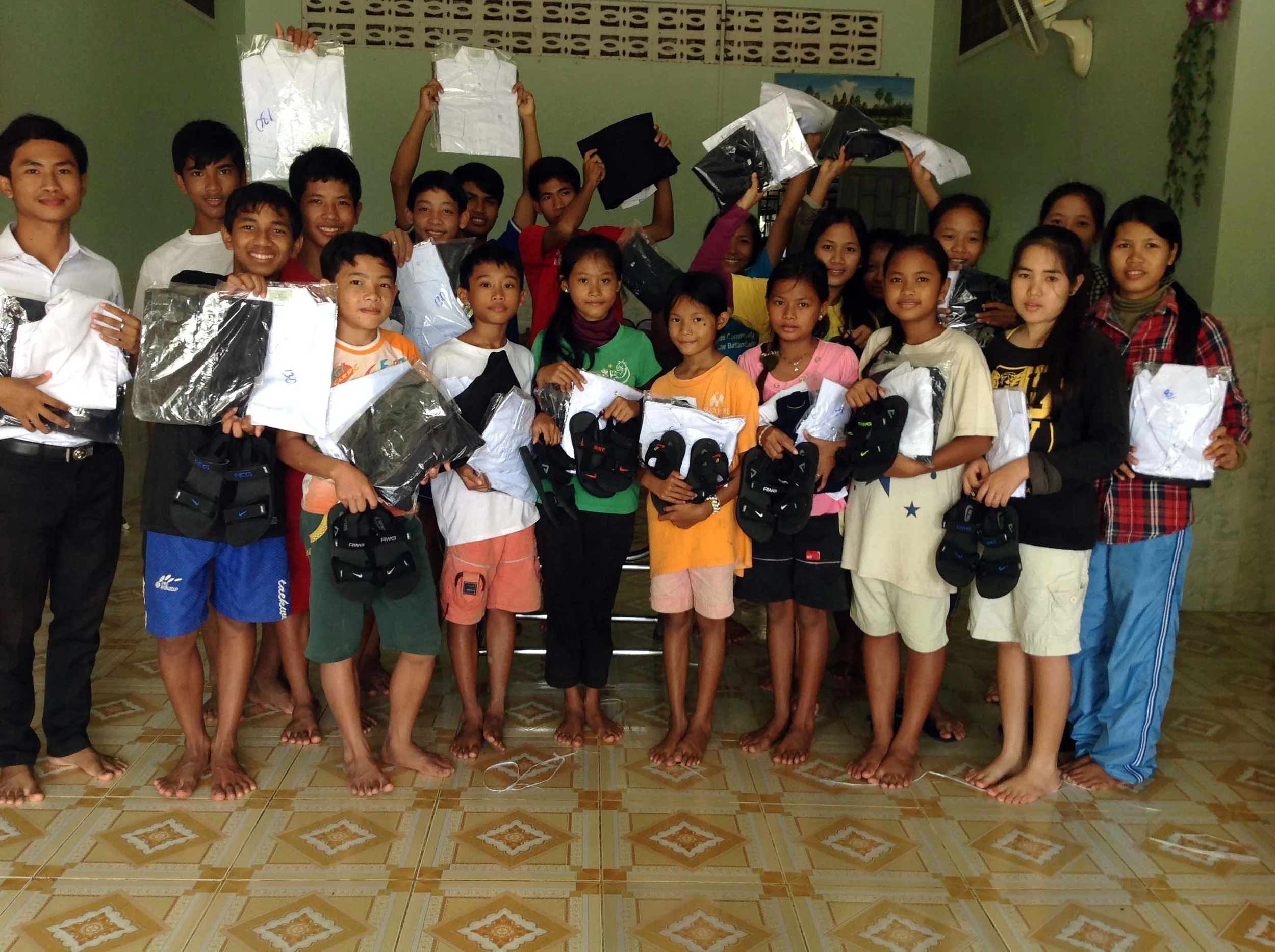 The kids show off their new school supplies!