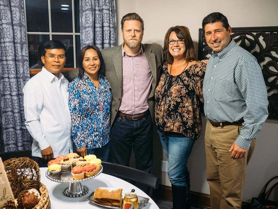 Savorn Ou, Cambodia Director with his wife Sony, Executive Director John McCollum with Tim and Michelle Armstrong at a welcome dinner hosted at the Armstrong home in October. Tim is the pastor of The Chapel (Akron, OH), one of our newest partnering churches.