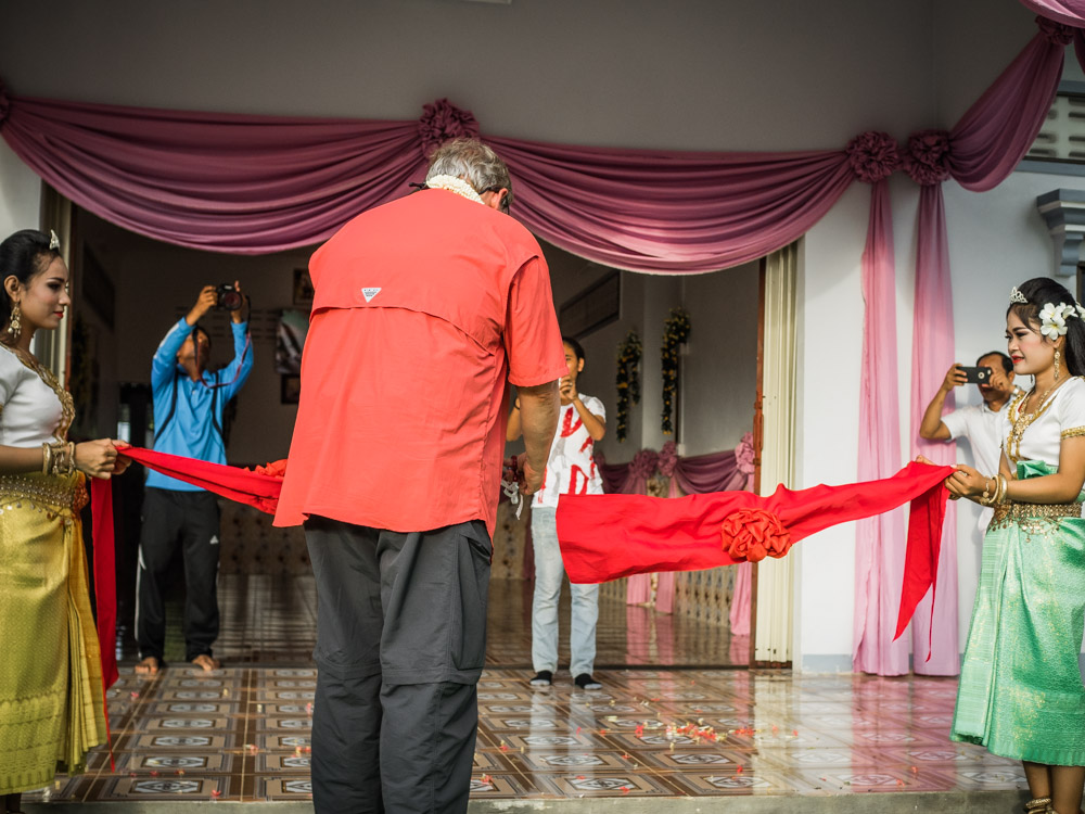Wes Polsdorfer cuts the ribbon at the Battambang 13 Children's Home