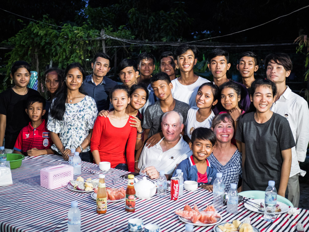 Mark and Beth Voltmann enjoy a special dinner cooked by Phally, one of the girls from the Prek Eng 4 Children's Home; Phally is currently attending culinary school.