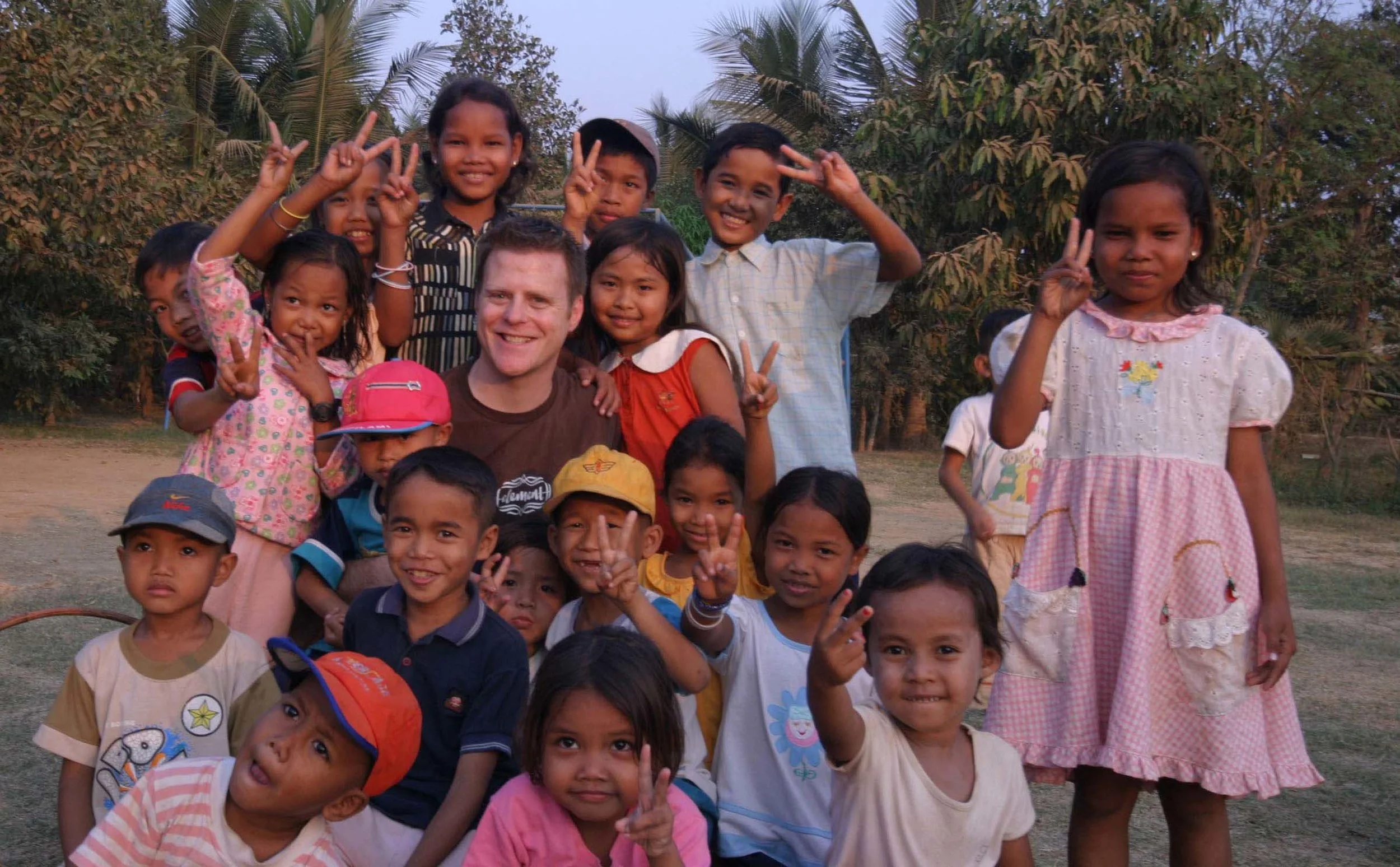 Me in February 2005, at our very first home in Battambang, Cambodia. Most — if not all — of these kids are now grown.