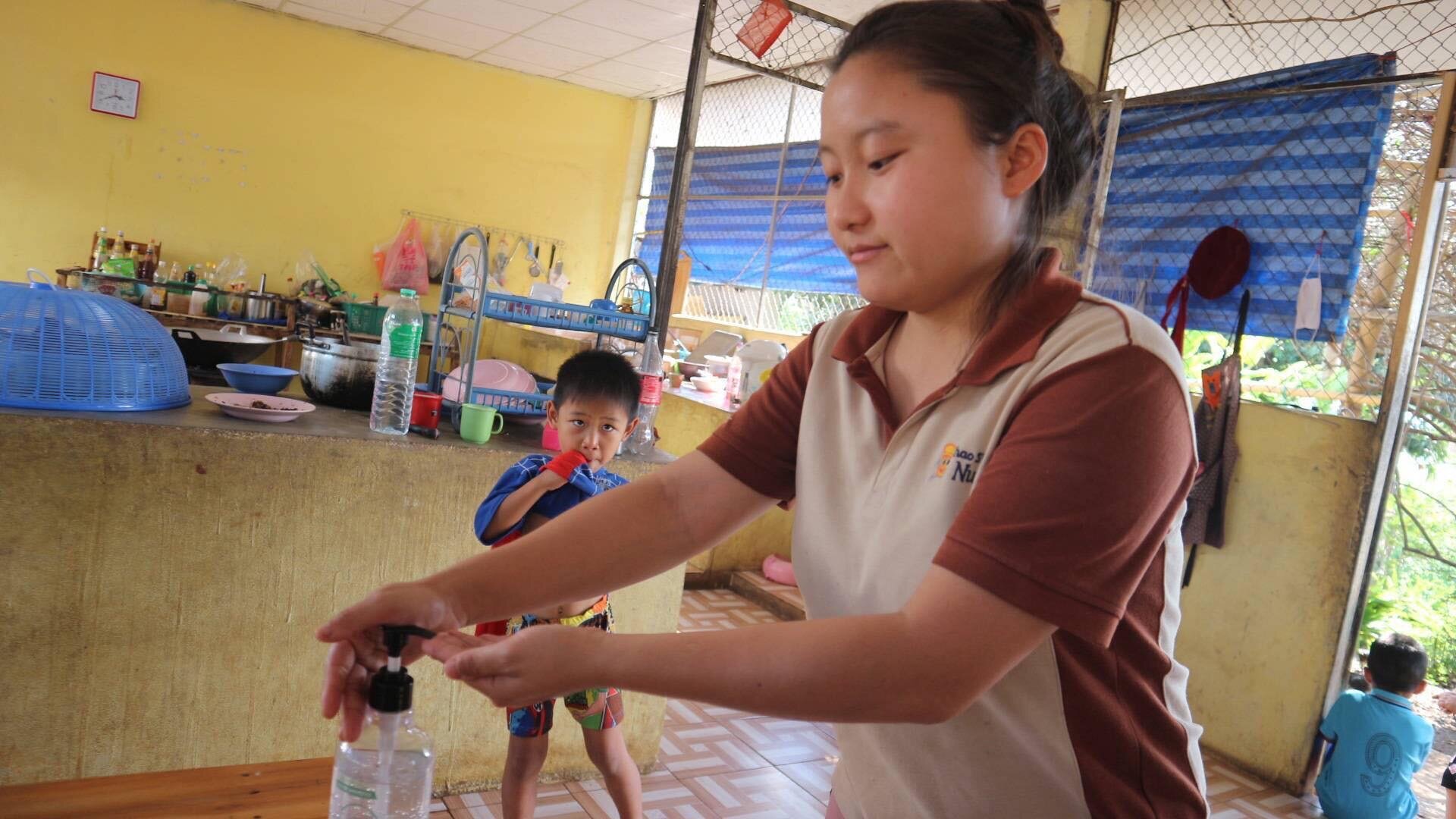  The older kids at our homes in Wiang Pa Pao, Thailand make sure the little ones know how to properly wash their hands. 