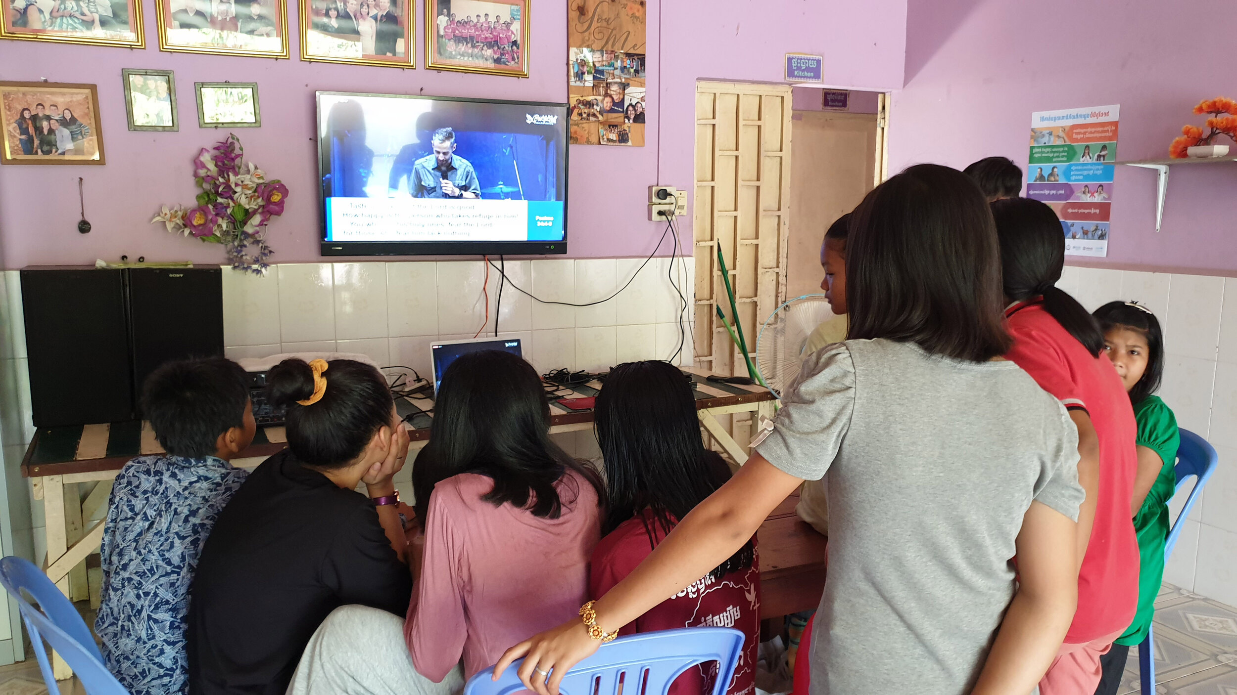  Like many of their supporters across the globe, these kids in Cambodia are watching church services from their living room. 