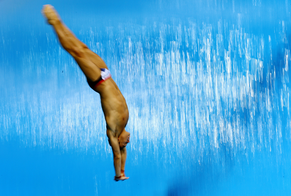  ​  Tom Daley of Great Britain practices at the Aquatic Center on July 17 during previews ahead of the Games. (Paul Gilham/Getty Images) 