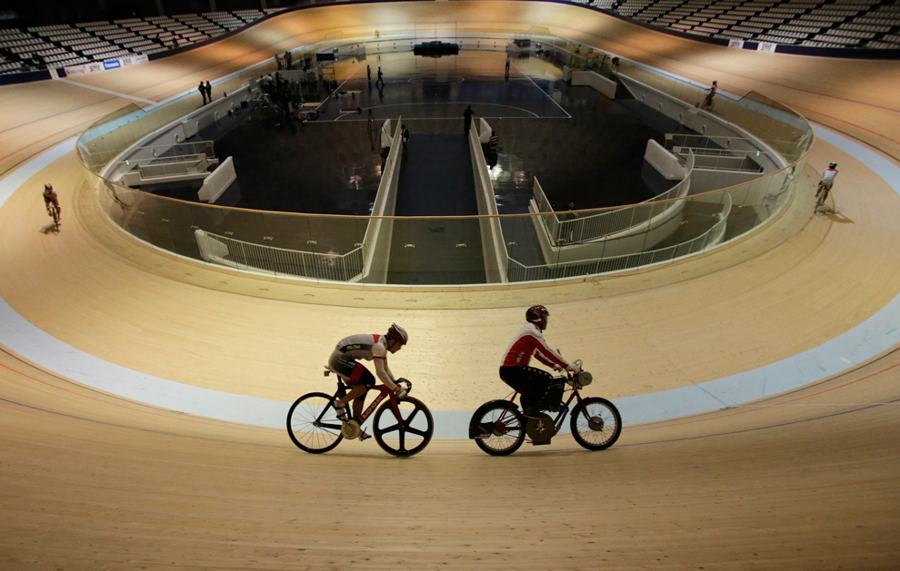  ​  Japanese professional keirin cyclist Kazunari Watanabe (left) whose home town of Futaba is within the 20-km (12-mile) exclusion zone around the tsunami-crippled Fukushima Daiichi nuclear plant, takes part in a training session in Izu, Shizuoka pr