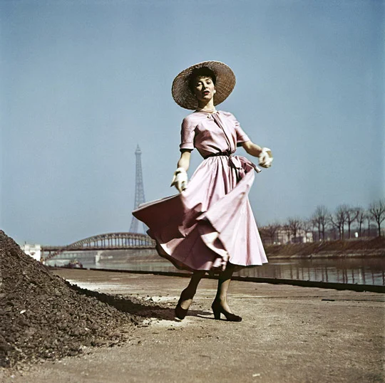 Model wearing Dior on the banks of the Seine, Paris, 1948.
