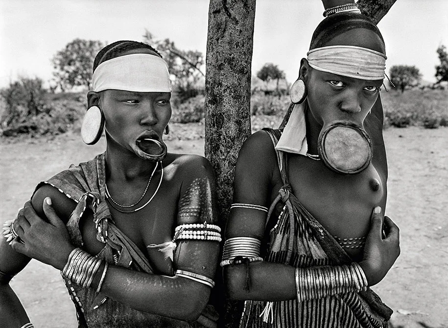 The Mursi and the Surma women in Ethiopia wearing lip plates as a mark of high birth (2007)