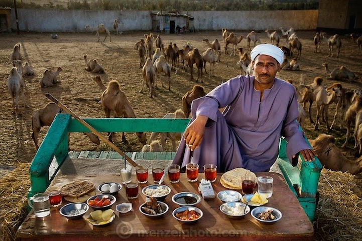 40 years old; 5 feet, 8 inches tall; and 165 pounds, Camel broker Saleh Abdul Fadlallah outside Cairo, Egypt. 3200 calories.