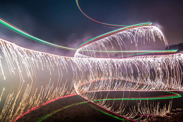 Long Exposure Photos of Fireworks Strapped onto a Drone