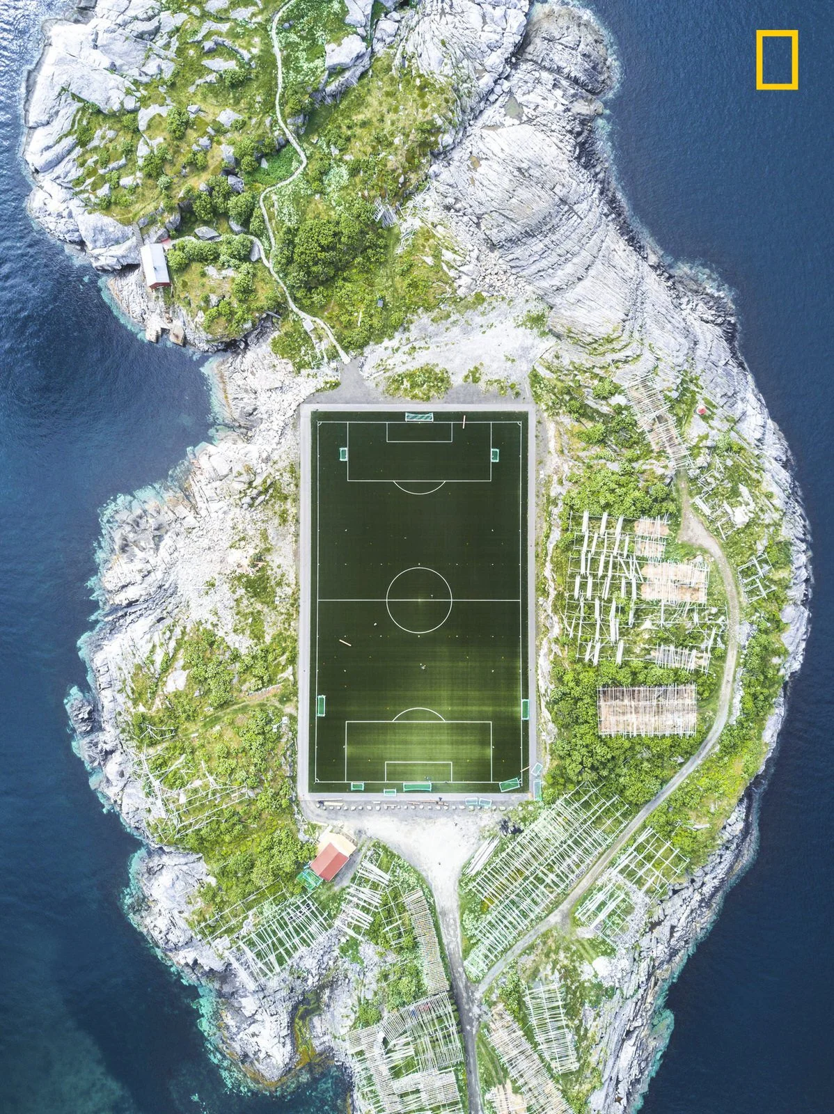 3rd Place. Photo and caption by Misha De-Stroyev/ National Geographic Travel Photographer of the Year. Henningsvær Football Field . "This football field in Henningsvær in the Lofoten Islands is considered one of the most amazing fields in Europe, and maybe even in the world. The photo was taken during a 10-day sailing trip in Norway in June 2017. We arrived at Henningsvær after a week of sailing through the cold and rainy weather. Upon our arrival, the weather cleared up. I was really lucky that the conditions were suitable for flying my drone, and I managed to capture this shot from a height of 120 meters."