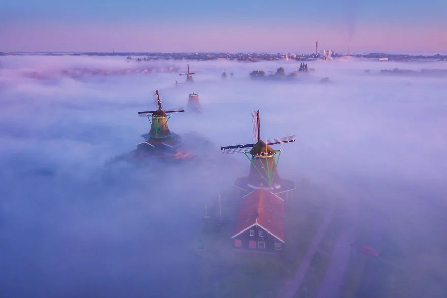 Dutch Village and Windmills in the Fog - Photos by Albert Dros
