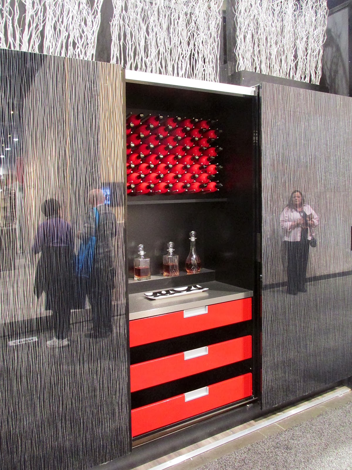 Highly reflective doors with an internal texture.