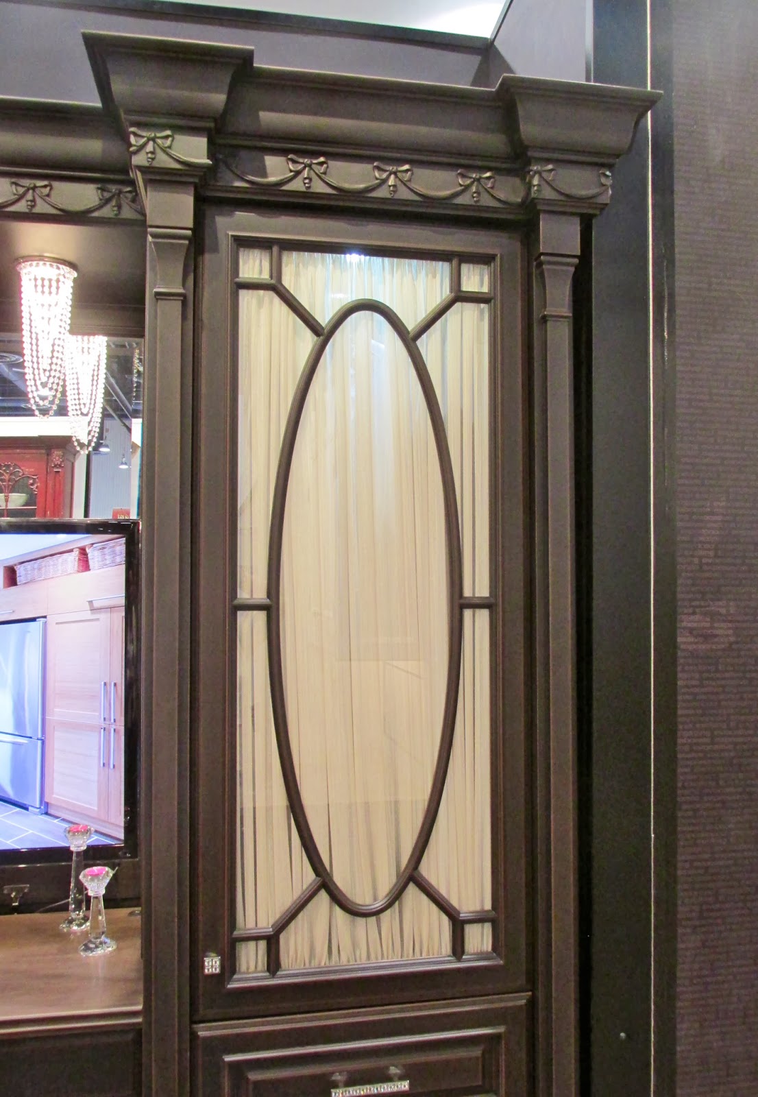 Another glass door. The grey-green color lends a modern feel to this traditional design.