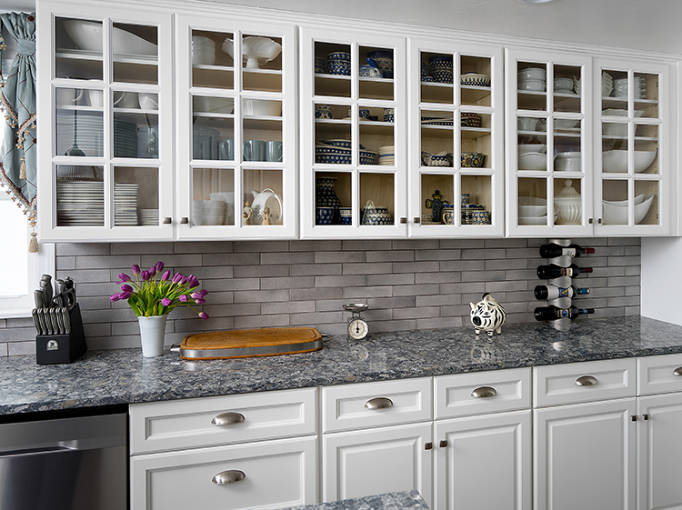 Designing your kitchen with glass-front cabinets