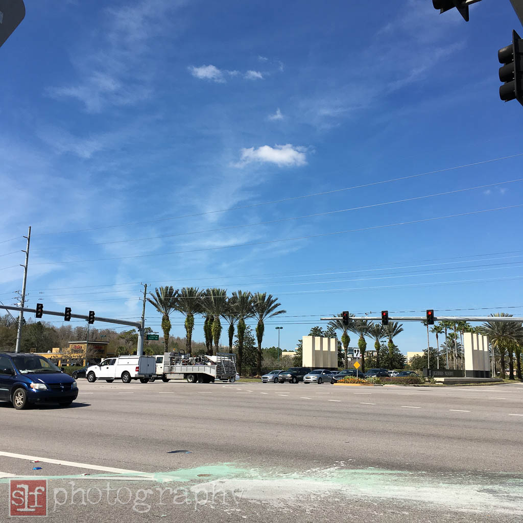 I waited at the crosswalk for the light to change.