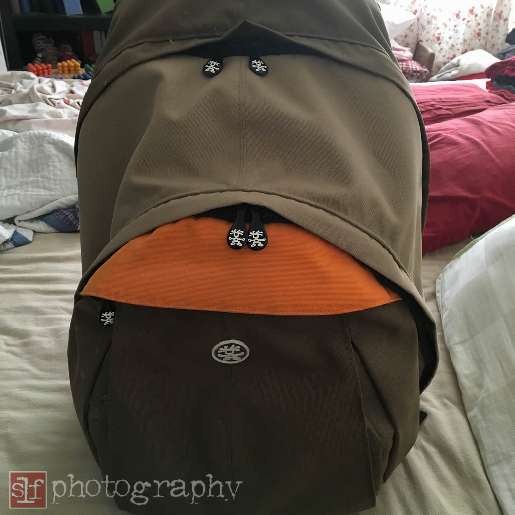 I took my Crumpler backpack. It is more padded and has some channels to allow airflow against my back. However, it is heavy.