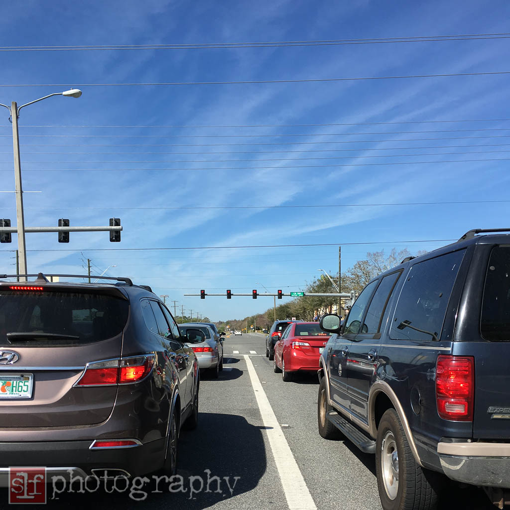 Most of the time I try to ride by the rules of the road. I am waiting in line to turn left.