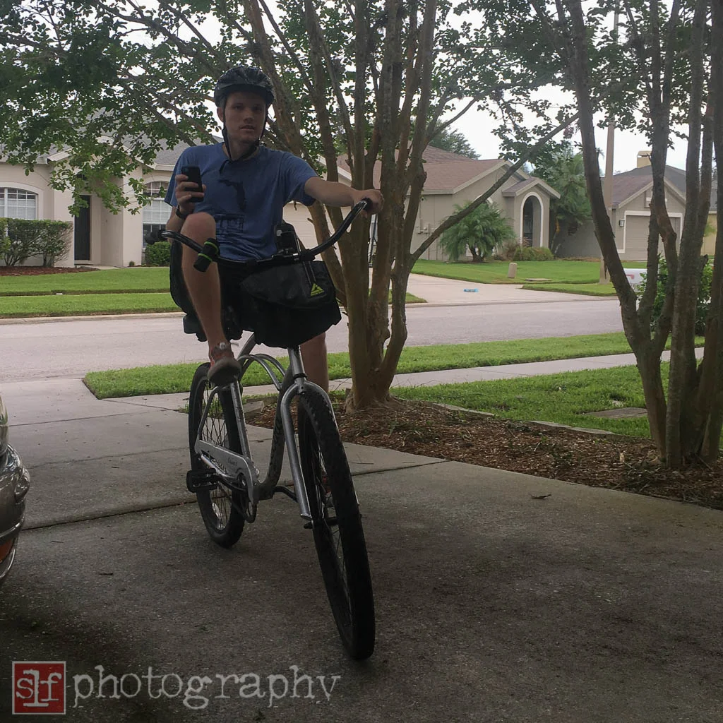 ryan still doesn't use his brakes but hops of the bike to stop