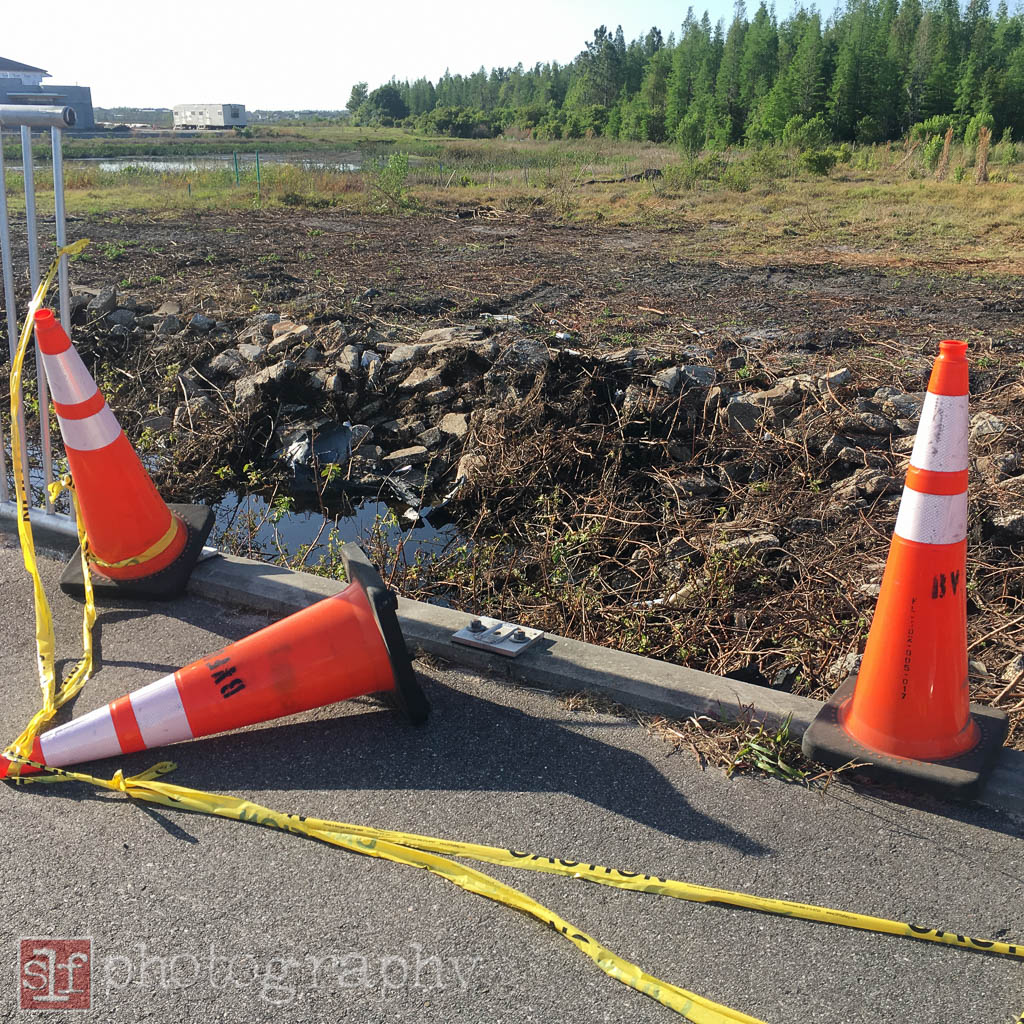 path along sr56. a car smashed through the barrier.