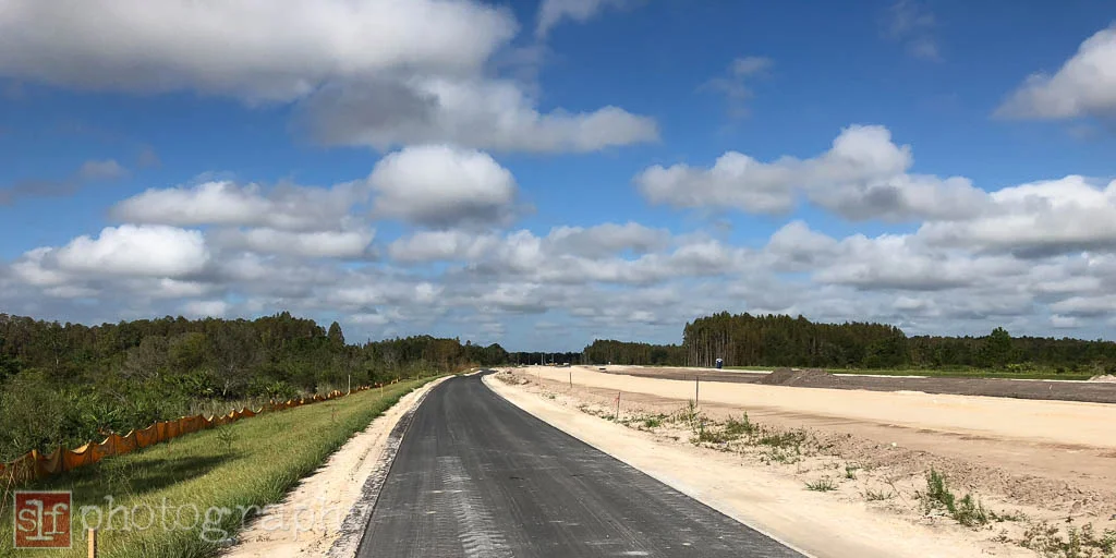 sr56 extension looking west toward meadow pointe blvd