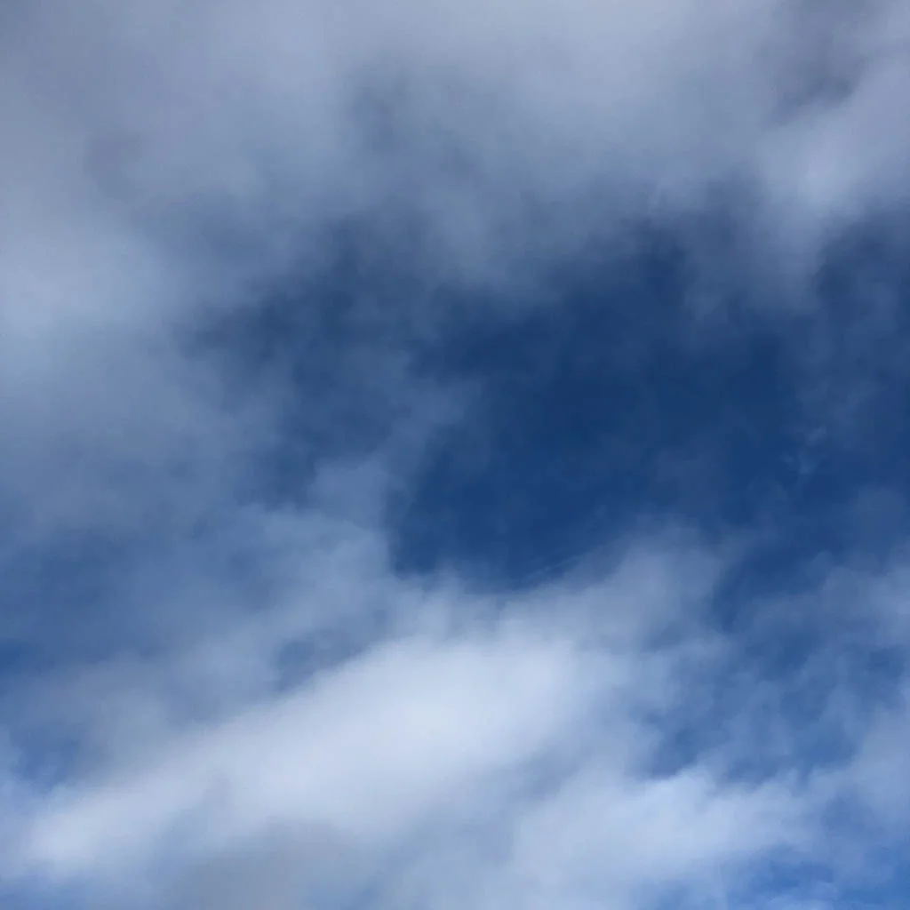 patches of blue skies through the cloud