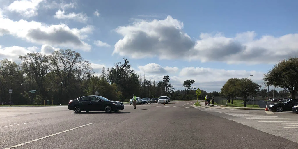 i had to stop for school traffic. the regular crossing guard has been out sick.