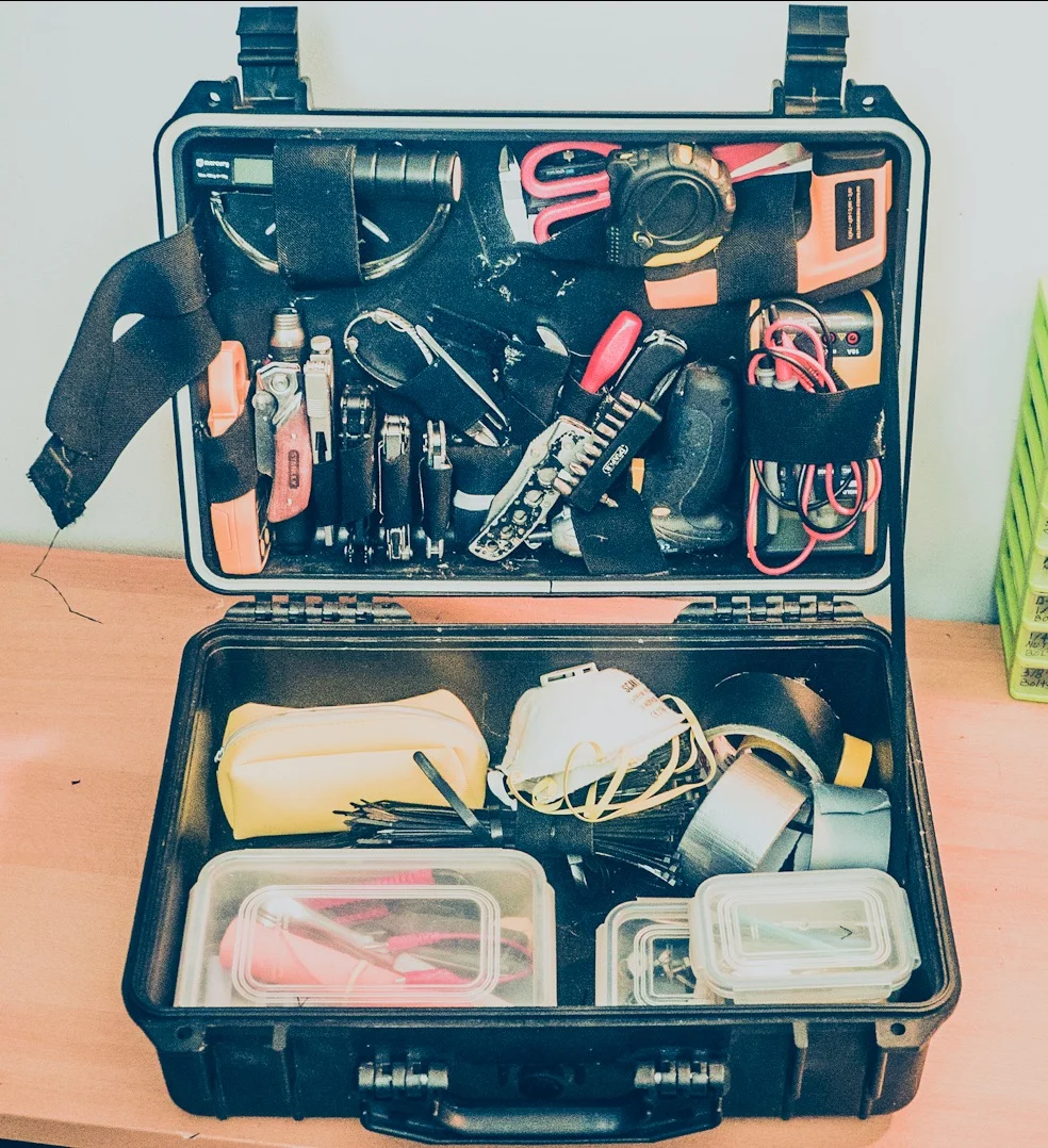 My tool case with customized elastic straps for my tools. Works really well. I will have a video with a small tutorial about it.