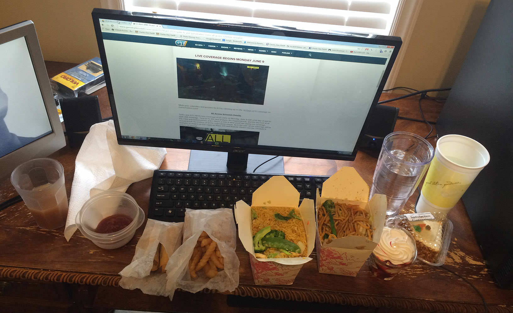 Apple juice, ketchup, two spring rolls, small fries, large vegetable fried rice, large vegetable lo mein, strawberry parfait, carrot cake, two large cups of water.