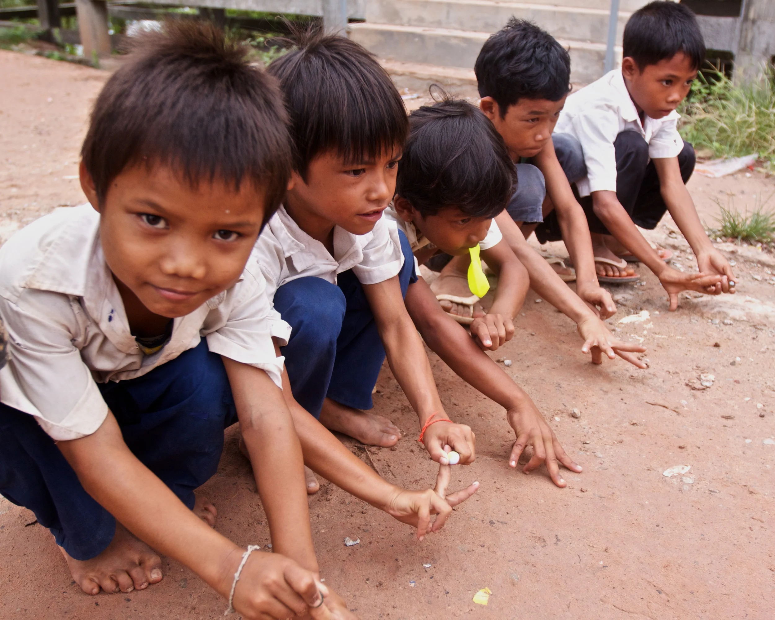 All kids play marbles.jpg