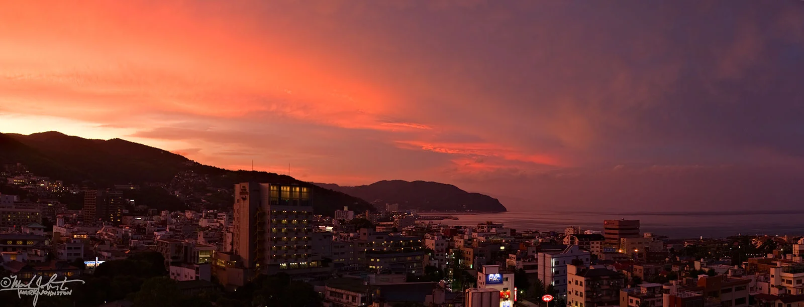 Sunset over the city of Ito, Japan.