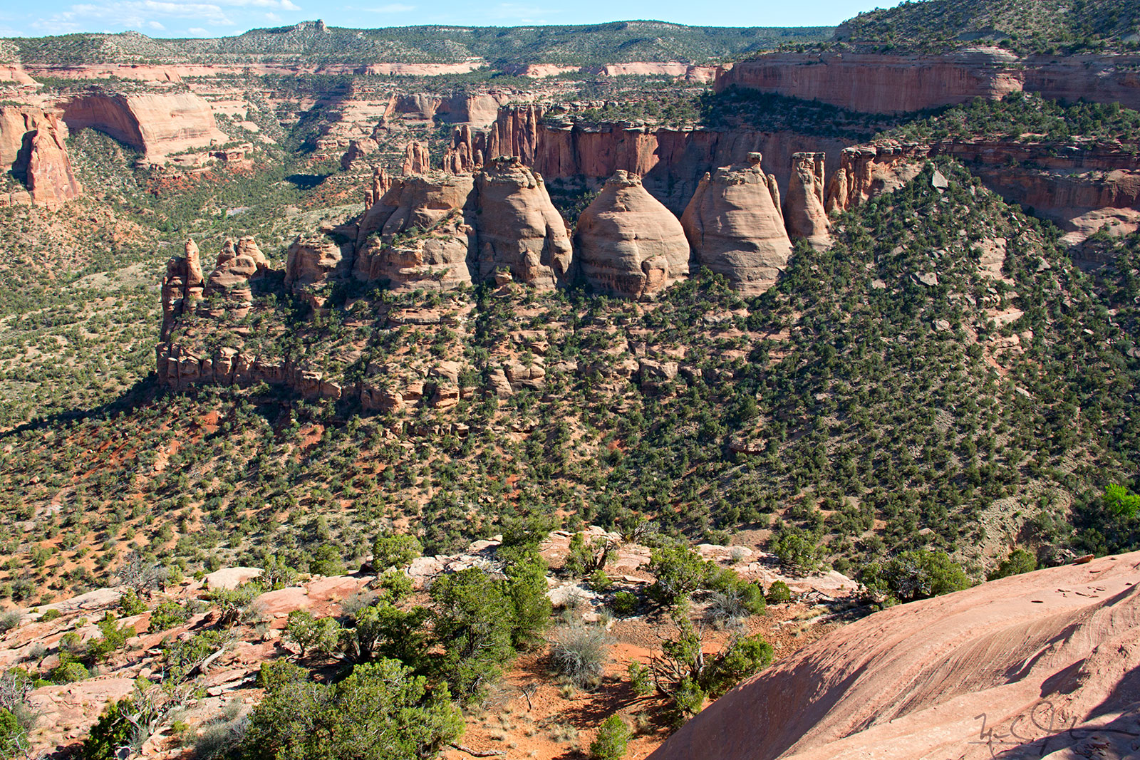 The so-called "Coke Ovens", also known as the "Haystacks". The stacks are composed of Wingate Sandstone about 200 million years old, with caps composed of harder material called the Kayenta Formation. 